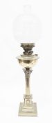 Late 19th / early 20th century brass oil lamp with etched opaque and clear glass globular shade,