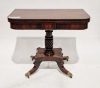 Regency mahogany fold-over tea table, the rectangular top with rosewood inlay and rounded front
