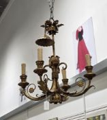 A pair of Italian gilt metal four branch chandeliers by Ciani with foliate scrolling decoration,