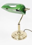 Banker's-style desk lamp with green glass swivel shade, on a gilt metal base, 38cm high