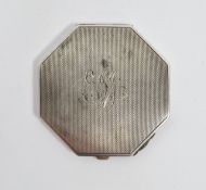 Silver compact of octagonal form with engine-turned decoration, 6.5cm diameter, 1.7ozt approx