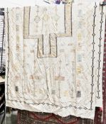 Large Moroccan/Berber cream ground rug with central cross on geometric and floral pattern field,