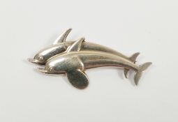 Danish silver brooch by Georg Jensen, modelled as two leaping dolphins, no. 317 to reverse, 4cm long