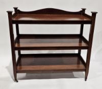 Edwardian mahogany and satinwood inlaid three-tier buffet having a shaped back rail, square