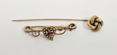 Late Victorian/Edwardian yellow metal, seed pearl and ruby brooch and a diamond mounted hat pin, the