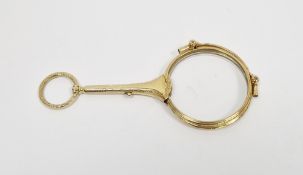 Pair of gold folding lorgnettes with circular lenses, engraved handle, marked 585 weight 28 grm