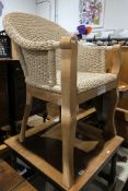 Beechwood and wicker seated tub chair, 85cm high x 61cm wide x 54cm deep and an oak square coffee