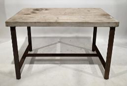 Industrial-style tall bar table with pine scaffold plank top, on a rusted metal base with straight