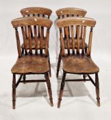 Set of four 19th century lathback kitchen chairs with elm seats, on turned tapering legs united by