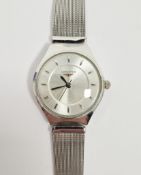 Longines stainless steel watch, A50-1244, the silvered face with baton markers, on a silver tone