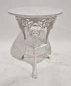Pub table, the white circular marble top on a white painted cast iron base, the three legs decorated