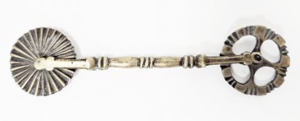 Antique brass pastry jigger, with wheel cutters to either end, 14m long Condition Report General