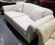 S Rouse & Co of Cheltenham two-seater sofa, shaped in the 19th century manner, with cream