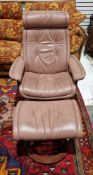 Ekornes reclining armchair and matching footstool, upholstered in a salmon coloured leather, each on