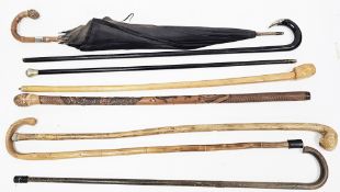 Early 20th century umbrella with bamboo handle and rootball handle and rootball finial, with a