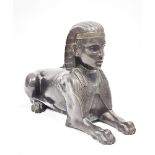 20th century hollow bronze cast model of a sphinx, probably from a mantel piece garniture, 26.5 cm