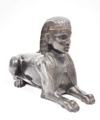 20th century hollow bronze cast model of a sphinx, probably from a mantel piece garniture, 26.5 cm
