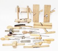 Collection of woodworking tools including A.Mathieson and Sons sash fillister plane, two further