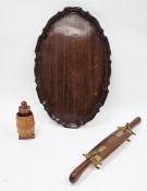 Mahogany oval tray in the George III manner with piecrust edge, 47cm long together with an Indian