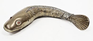 Indian brass Medina articulated model of a fish, lacking one glass eye and fins, 26cm long