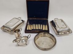 Collection of silver plate including pair of rectangular lidded tureens, sauce boat, baluster