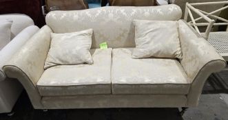 S Rouse & Co of Cheltenham two-seater sofa, shaped in the 19th century manner, upholstered in a