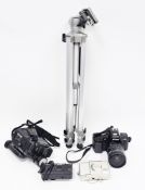 Collection of cameras and equipment including Nikon F-801camera with Nikon AF Nikkor 28-85mm lens,