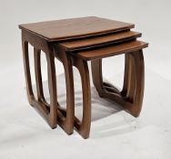 Mid-century teak nest of three tables, in the manner of Nathan Burlington, largest table 47cm high x