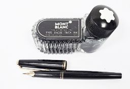 Mont Blanc fountain pen in black lacquered and gilt mounted case, the 14ct gold nib stamped 585,