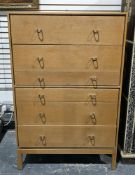 Mid-century Stag blonde oak chest of six long drawers of various depths, with brass loop handles, on