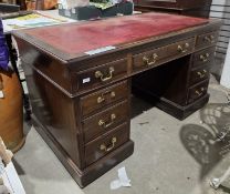 19th / early 20th century mahogany twin pedestal desk, the rectangular top with red leather inset