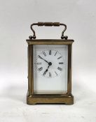 Brass cased carriage clock, the enamel dial with Roman numeral hour markers, 11.5cm high
