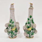 Pair of Meissen (outside decorated) Schneeballen bottle vases and covers, circa 1880, cancelled blue