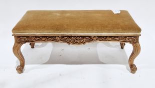 Early 20th century walnut long stool, the gold velvet upholstered seat opening to a sheet music