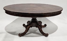 Victorian rosewood oval breakfast table on a bulbous central support with acanthus leaf carving