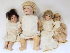 Four Armand Marseille bisque headed dolls marked Germany 390. A 3/0 M & 990. A.4.M , 390n D.R.G.M