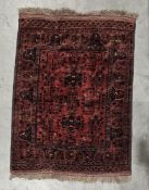 Eastern brown ground rug with two geometric medallions on floral field, multiple geometric and