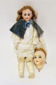 Bruno Schmidt bisque headed doll, no.692 with brown fixed eyes, moulded upper teeth, composition
