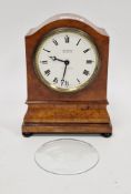 Early 20th century mantel clock, the domed burr walnut case with a white enamel dial having Roman