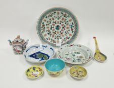 Chinese export porcelain famille rose soup plate painted with a vase on rockwork before willow and