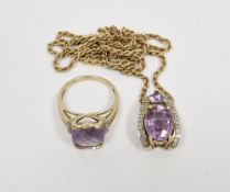 9ct gold ropetwist chain hung with gold-coloured pendant set an oval and triangular faceted amethyst