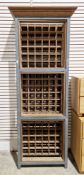 French Vinotheque de Kercoet wine rack, the wooden and grey metal frame holding three tiers of