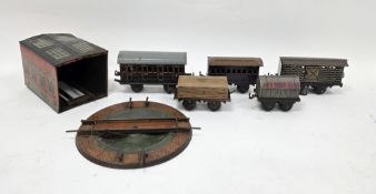 Bing 0 gauge railway to include train shed, 4 door passenger coach, cattle truck, cement wagon, flat