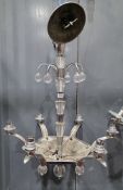 A Hector Finch contemporary chromed six branch chandelier with glass decoration and glass panels,