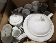 Modern Chinese part dinner and tea service with gilt decoration on a white ground, including tureens