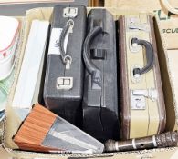 Collection of musical instruments and sheet music booklets including a guitar, cased Bundy clarinet,