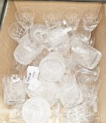 Large collection of mainly cut glass including drinking glasses, decanters, vases, bowls, sugar