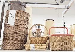 Two wicker baskets, a wicker stickstand, a leather-effect waste paper bin (no bottom) and other