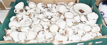 Large collection of crested souvenir china including Goss, items include a lighthouse, a house,