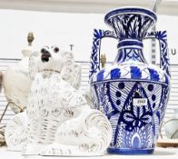 Pair of Staffordshire white glazed and gilt seated mantel dogs, 28cm high together with a Middle